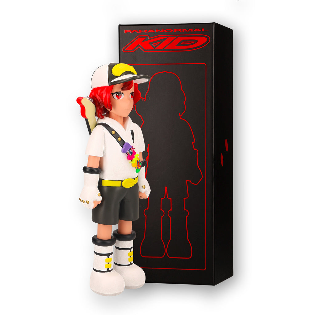 Action figure with colorful hair and outfit next to a black box with 'Paranormal Kid' branding.